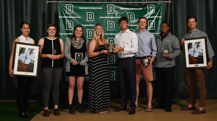 Some of the student-athletes hold their awards after the ceremony. 