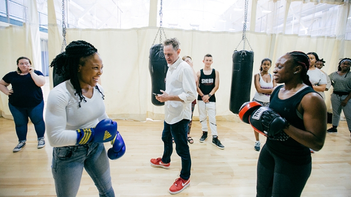 Jesse Shipley and his students about boxing at Alumni Gym