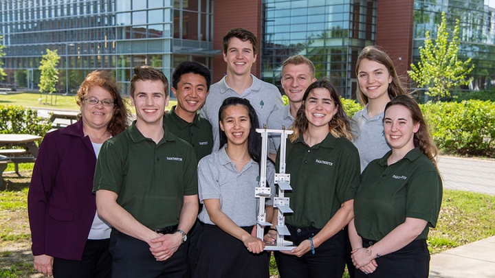 Dartmouth’s winning team poses with their trophy after pitching their idea for a Mars greenhouse at NASA’s Langley Research Center in Hampton, Va.