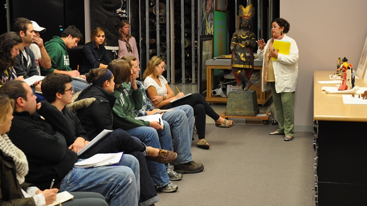 Vera Palmer lecturing a group of students