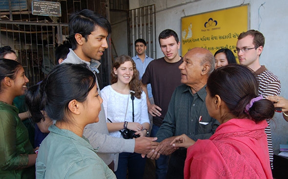 Joseph Singh ’14 shakes hands with a local guide