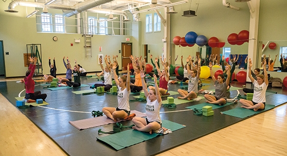 student-athletes participate in a yoga class