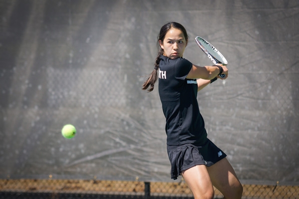 Taylor Ng playing tennis