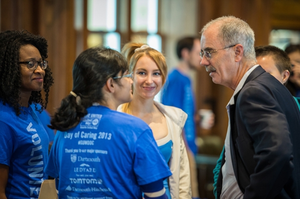 President Phil Hanlon ’77 speaks with students involved in the United Way Day of Caring
