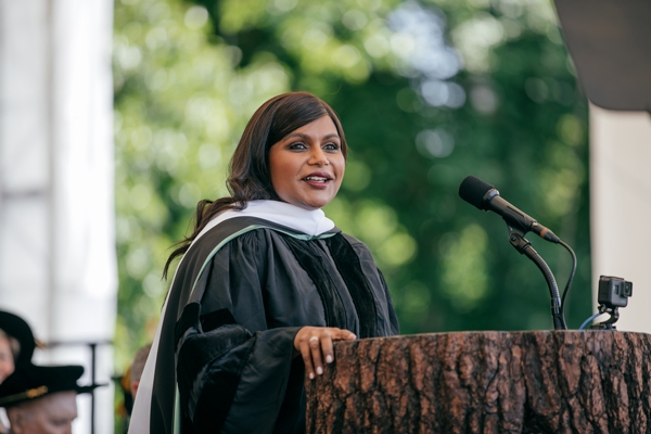Mindy Kaling speaks on stage at commencement.