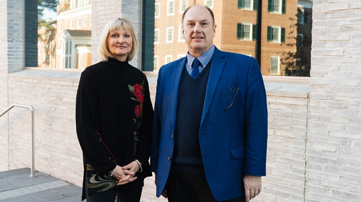 Dean of Libraries Sue Mehrer and John Stomberg