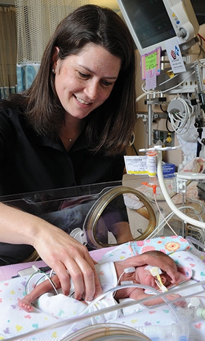 Professor Juliette Madan with premature infants