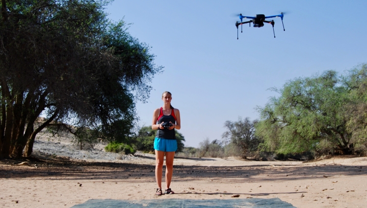Bryn Morgan flying a drone in the Namib Desert.