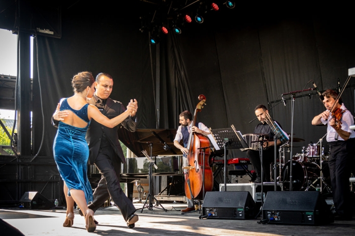 Andrés Bravo and Sarita Apel, professional tango dancers based in New York City, perform with the Pedro Giraudo Tango Quartet to kick off the free evening concert program. (Photo by Lars Blackmore)