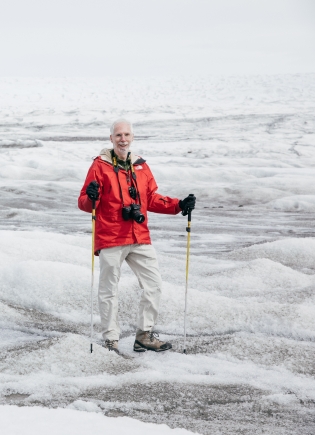 Ross Virginia standing on the permafrost in Greenland.