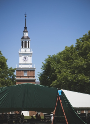 Staff sets up the Commencement stage.